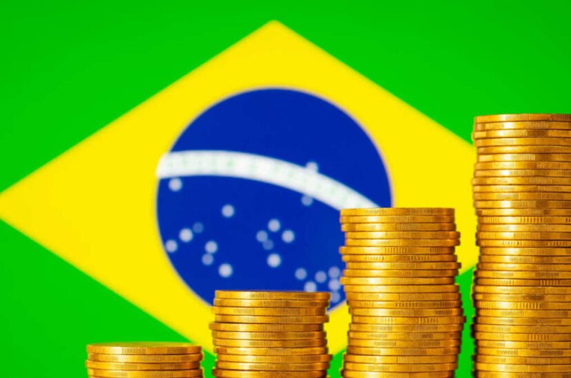 stacks golden coins background flag brazil concept rise economic development positive statistics brazil 3 828x548 1